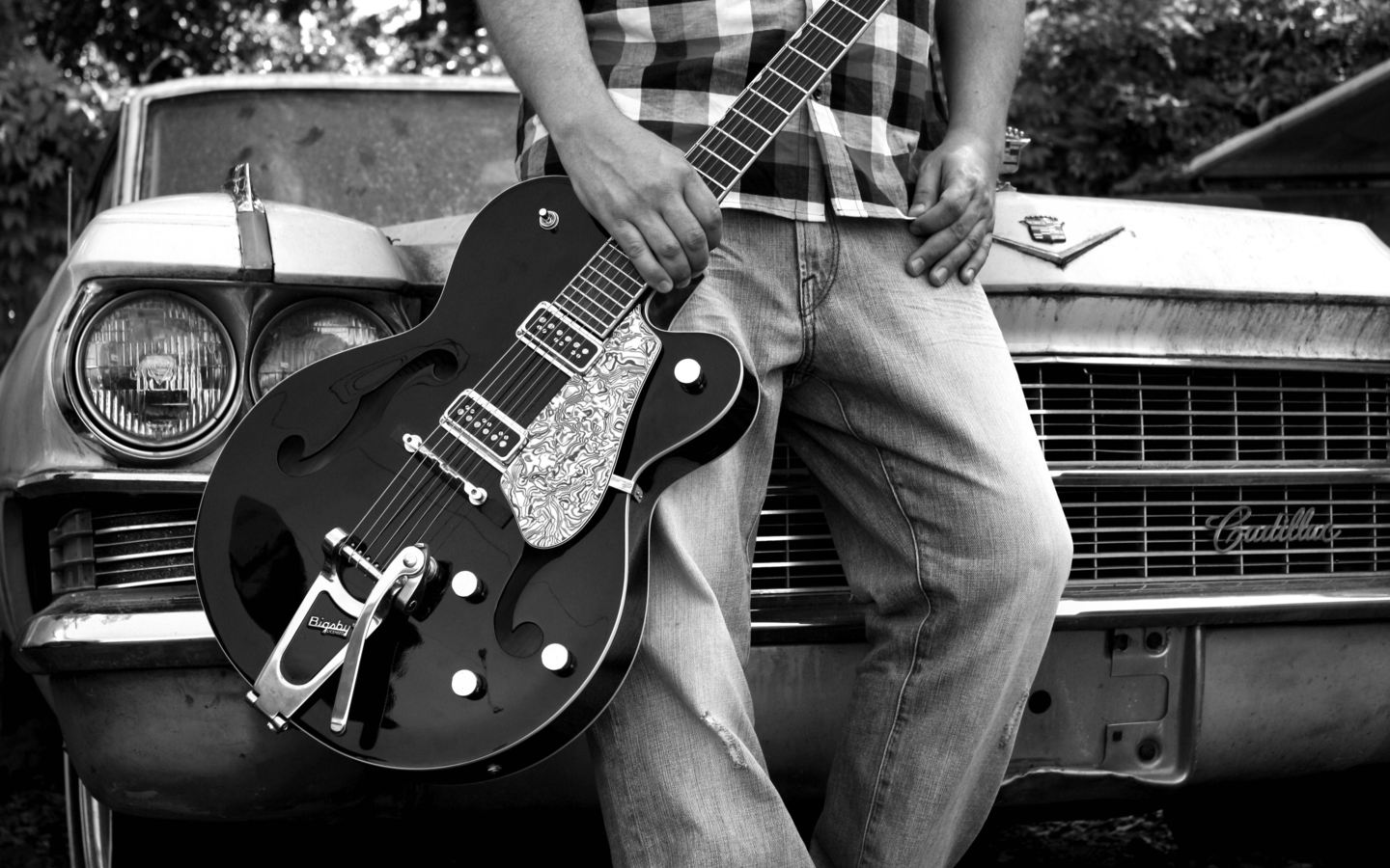 Holding A Guitar Heartwood Guitar